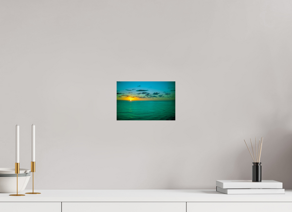 A Caribbean Sunset captures the vibrant hues of the sky over tranquil waters, perfect for any coastal decor.