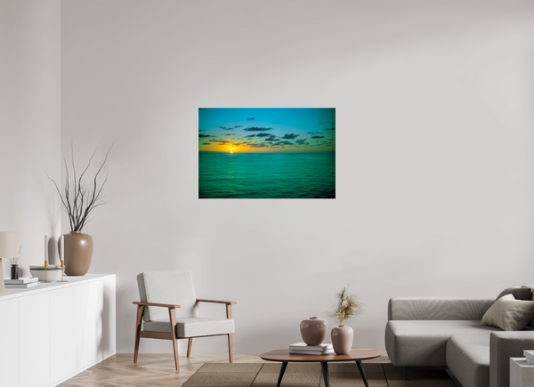 A Caribbean Sunset illuminates the ocean, showcasing vibrant colors that capture the beauty of tropical evenings.
