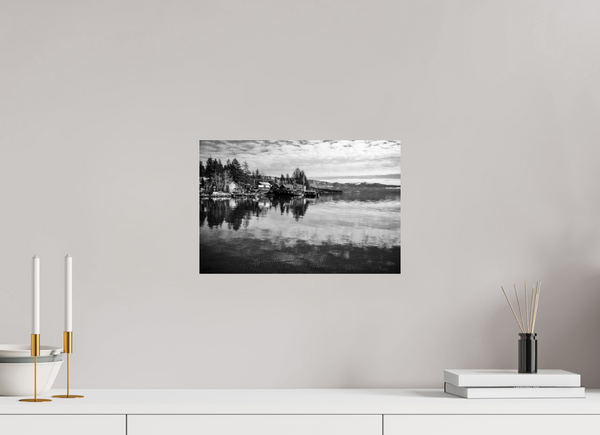 Tranquil reflections capture the essence of “Serenity on the Water – Lake Tahoe in Black and White.” Perfect for decor.