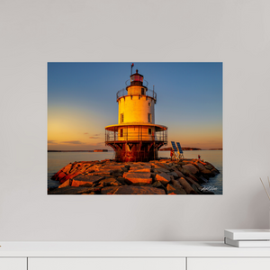 Golden Hour at Spring Point Ledge Lighthouse captures Maine's coastal charm in stunning sunset hues. Perfect for any space.