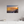 Serene sunset view of Grand Haven channel, capturing the essence of Calm on the Channel. Perfect for coastal decor.