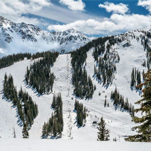 Breathtaking view of the Face of A-Basin, showcasing Arapahoe Basin's stunning snowy slopes and peaks.