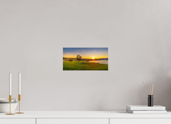 Breathtaking sunrise over the iconic No. 18 at Pebble Beach, bringing vibrant greens and blues to your space.