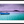 Boats are moored in a serene Caribbean harbor in the vibrant Aftermath in the Harbor artwork.