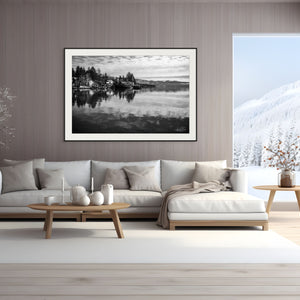 Stylish living room featuring "Serenity on the Water – Lake Tahoe in Black and White" artwork, capturing tranquil lakeside reflections.